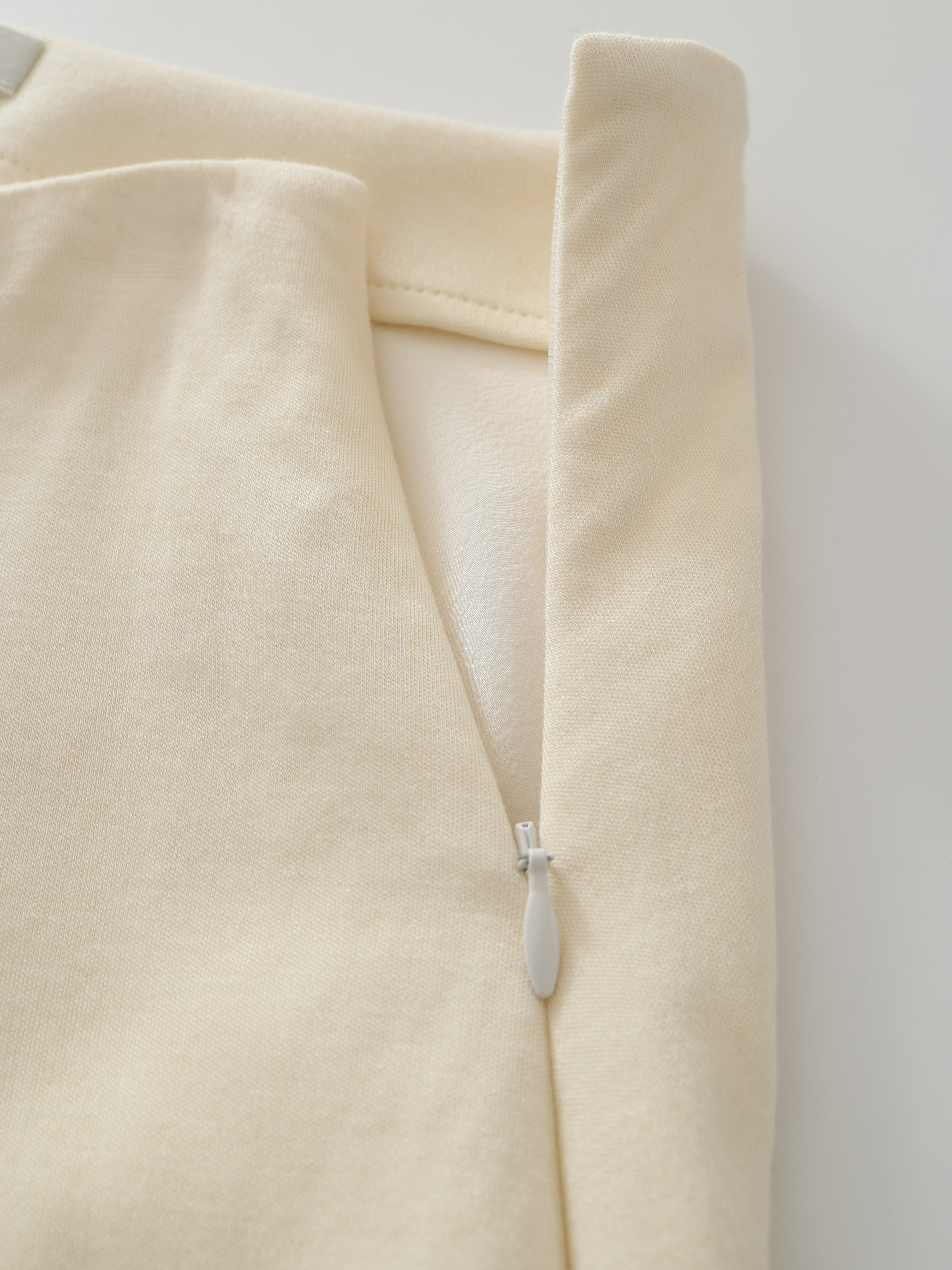 SS25 - Beveled asymmetrical pleated panelled skirt